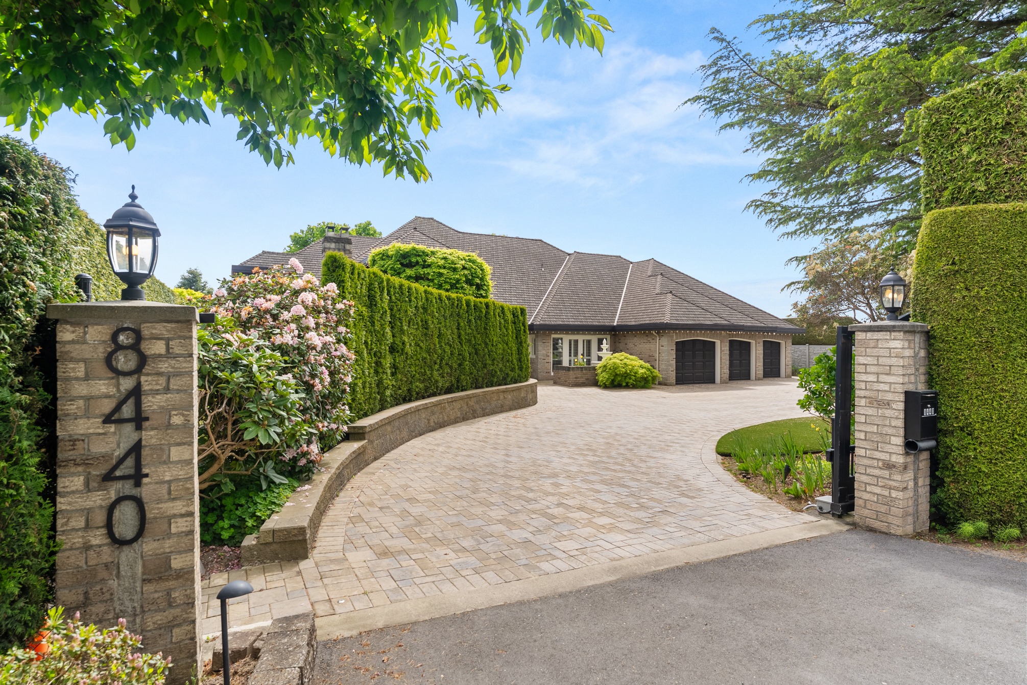 Grand gated arrival at 8440 Steveston Highway